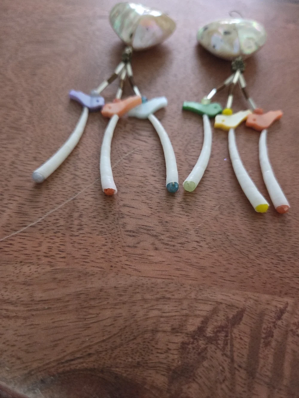 Handmade Native heart earrings with bird and flower shell details boho festival